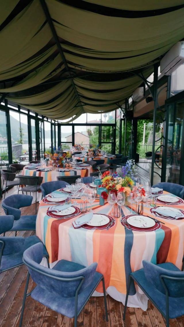 For Abby and Drew’s welcome dinner, we embraced their love of color and bold patterns. We paired these fabulous rainbow tablecloths from @ladoublej with hand painted plates from Milan based @laboratorioparavicini.  Each napkin was embroidered with a different Italian phrase and every detail was carefully curated through creative collaborative conversations to ensure a cohesive and playful design that perfectly reflected their vibrant celebration. 🧡 Planning + Design: @lakecomoweddings 
Video: @andreschlechtefilms 
Photos: @annajon.es 
Florals: @rattiflora 
Hair + makeup: @dawnartists 
Stationary: @afinepress  #TheLakeComoWeddingPlanner #RachelBirthistleEvents #Couple #Wedding #DestinationWedding #Event #WeddingPlanning #WeddingPlanner #Italy #EventDesign