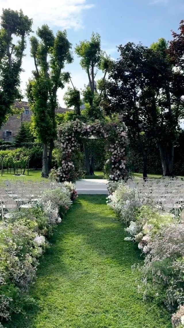 A lush outdoor garden tour at Belmond moments before the couple’s vows unveils a stunning ceremony area, surrounded by vibrant greenery, elegant floral arrangements, and serene pathways. The natural beauty of the garden sets the perfect atmosphere for an intimate and breathtaking celebration.
 
Planning: @jzevents
Design: @lakecomoweddings
Location: @belmondhotelcipriani
Entertainment: @nuart_events
Florals: @tearosevents
Sound & Lighting: @blunotteventi
Printed Goods: @letterink
#TheLakeComoWeddingPlanner #Venice #Venezia #BelmondHotelCipriani #Cipriani #HotelCipriani #Wedding #WeddingDesign #DestinationWedding