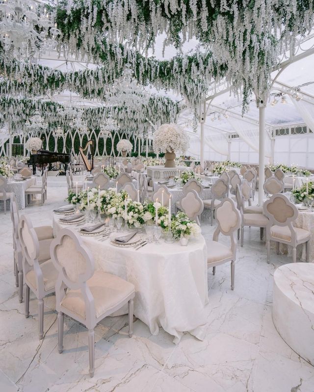 Exactly one year ago today in the magical city of Paris we celebrated @madelaine.lagrone and Jacob. We are so excited to share some of the unseen decor images from this beautiful event. 

Two twin greenhouses were built in the gardens of Château de Villette, one a custom white greenhouse that housed the reception. Madelaine’s vision for an all-white and green palette shaped the design, including a marble-effect aisle floor and connecting arches for a cohesive look. Topiaries were placed to complement the surroundings, extending along the aisle and up the hill for symmetry as well as inside the dining space as a backdrop to the stunning central bar. The mirroring black party greenhouse exuded a darker, more masculine ambiance, where guests partied the night away.

Planning & Design: @lakecomoweddings @rachelbirthistle
Photography: @gregfinck
Florals: @roni_floral_design
Videography: @lumos_produzioni
Location: @chateau_de_villette @theheritagecollection
Design & Production @HMRdesigns @rishithedesigner
Dress: @Dior
Hair & Makeup: @dawnartists
Catering: @classeventi
Wedding Cake: @bastien_blanc_tailleur
Entertainment: @elanartists
Printed goods: @yonderdesign
Bar services: @spumafashionmadetasty
Concierge and travel: @embarkbeyond and @aerialjets
Greenhouse tents: @lecoperture 
Bridal dressing: @maisiekatestyle
Content creator: @oliviaandliving.eventcontent

#TheLakeComoWeddingPlanner #RachelBirthistle #Wedding #WeddingPlanner #WeddingDesign #WeddingDress #Paris #DestinationWedding #WeddingInspiration #Florals #FloralDesign #WeddingPhotography #Dior #ChristianDior